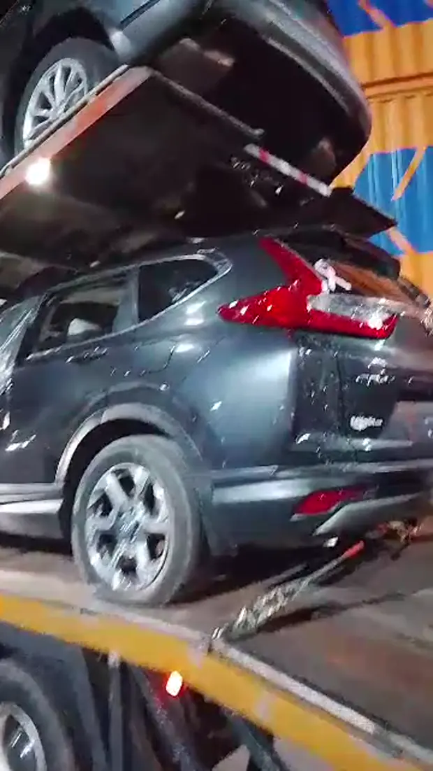 Cars secured for international vehicle transport